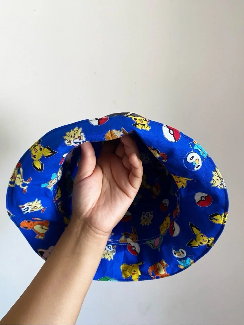 Hand Crafted Black Bucket Hat with Multi-Color Patch